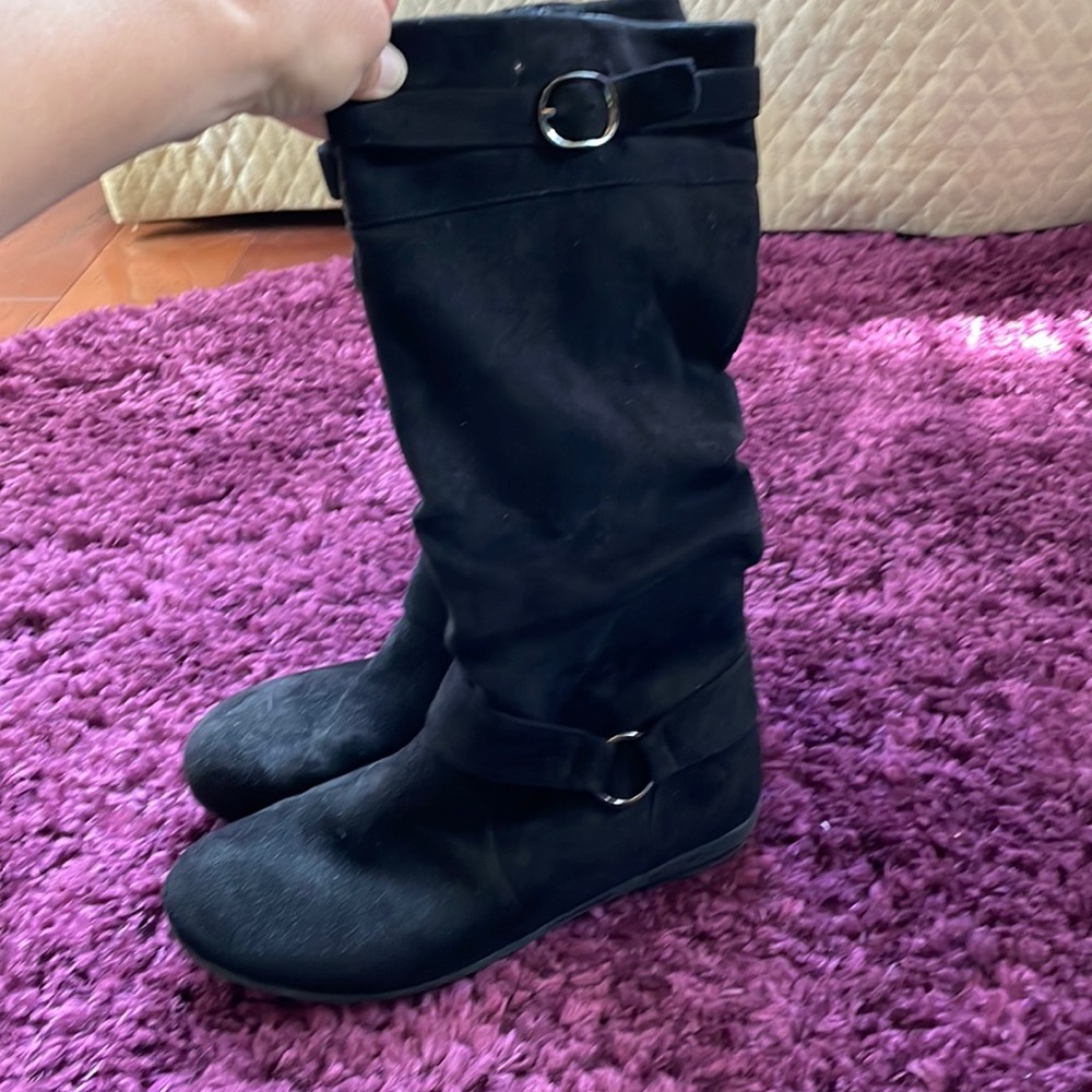 Suede “feel” boots. Double buckle accent, zipper on side.